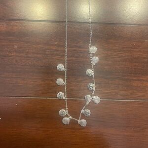Elegant Silver Brighton Necklace with multiple triple charms. Adjustable.